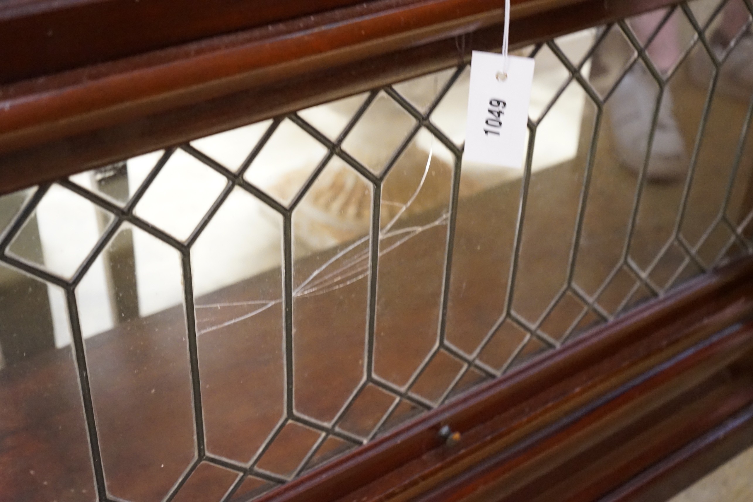 A Globe Wernicke type mahogany two section bookcase (lacks back panels), width 87cm, depth 29cm, height 100cm